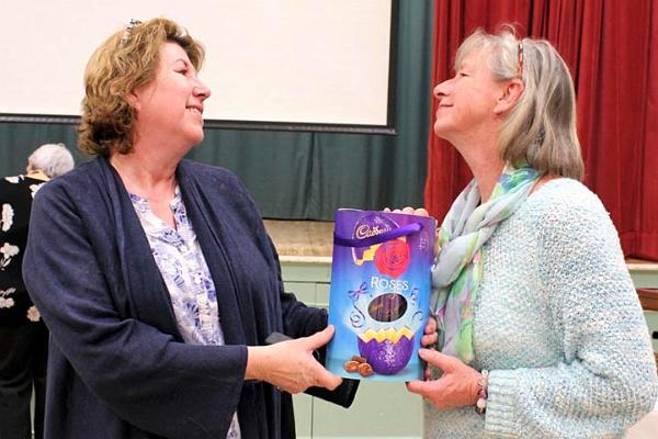 5. The Author presents Catherine with the raffle prize.jpg